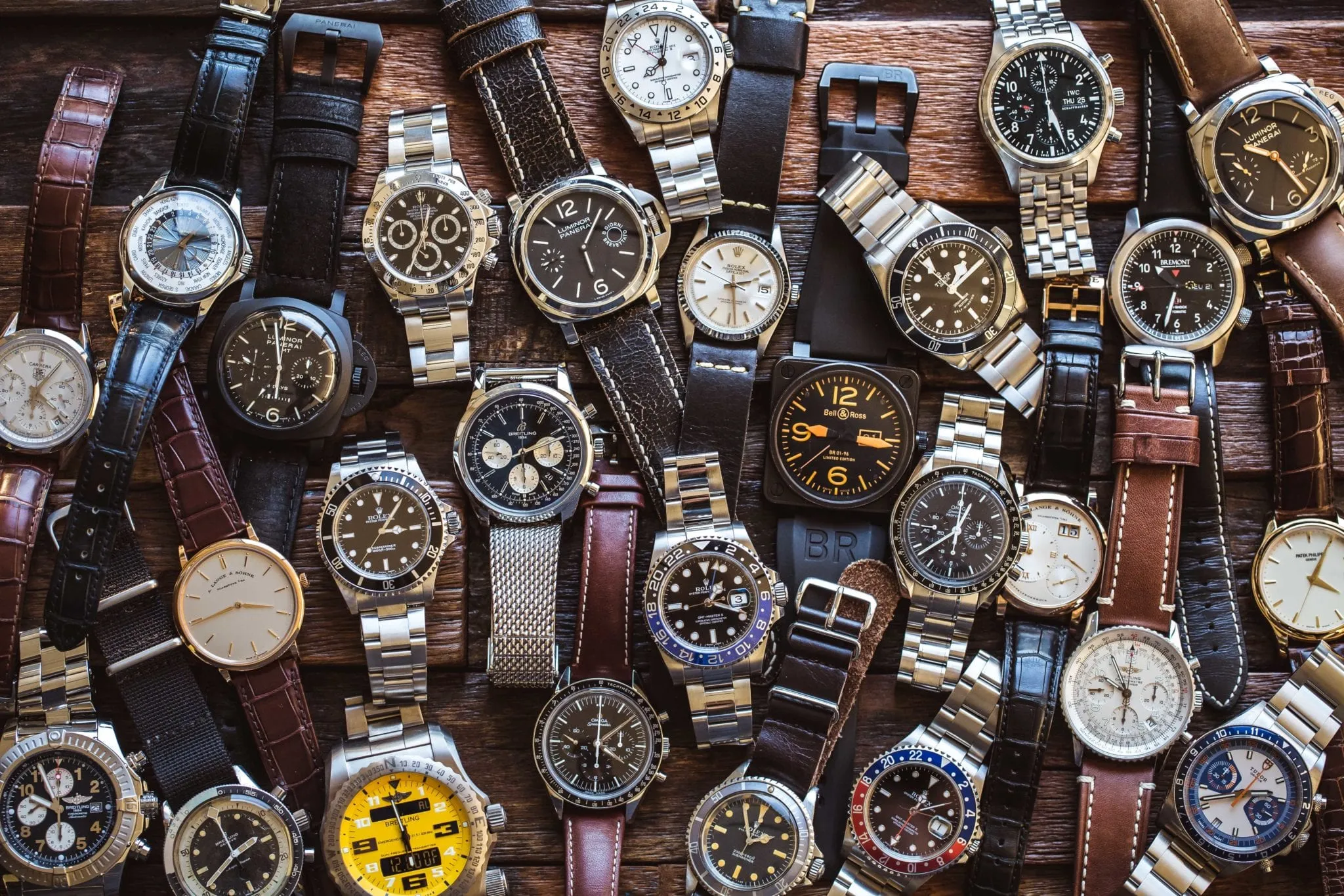 Variety of luxury watches, including pre-owned models