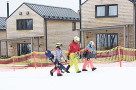 Ski School Smile | Snowboarding,Skiing - Rated 3.8