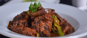 Chivo Guisado - National Main Courses in Dominica